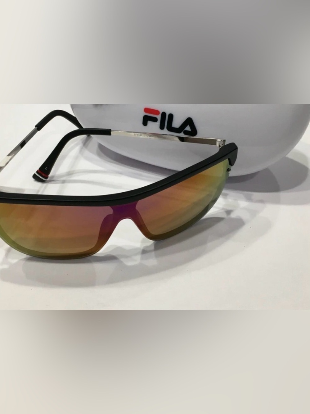 Fila Mirrored Shield Sunglasses in Black Frame with Iridescent Orange Lens